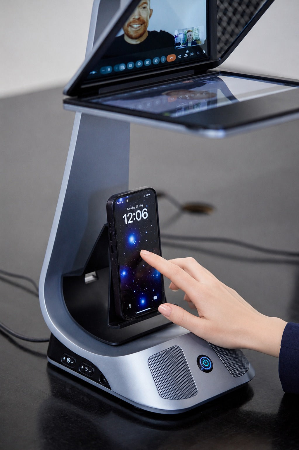 iVi phone holder accessory with wireless phone charging in use during a call.